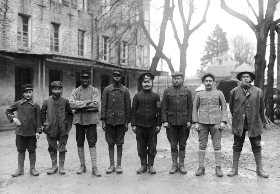 Diverse American soldiers standing together during World War I